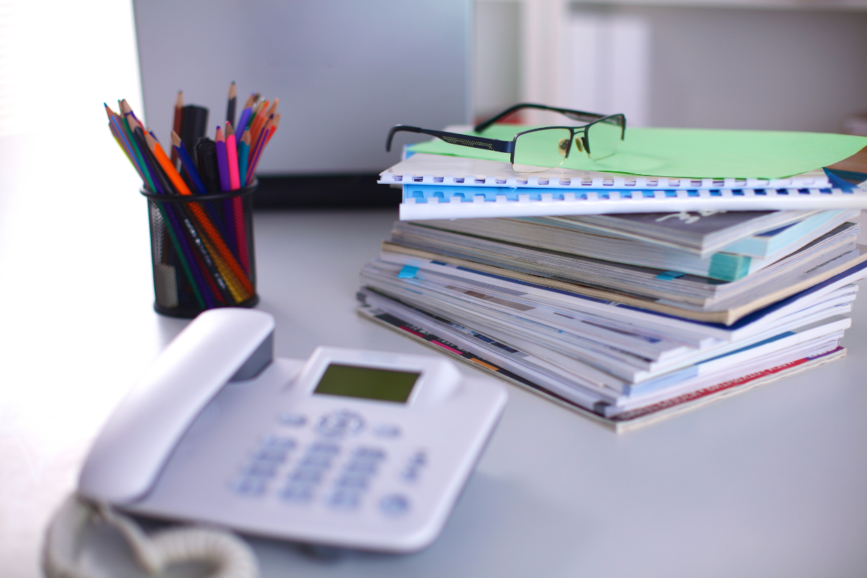 Organised desk with paperwork and folders representing professional admin support and bookkeeping organisation